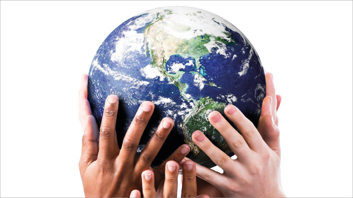 Illustration of many different hands grouped together holding an image of the globe 